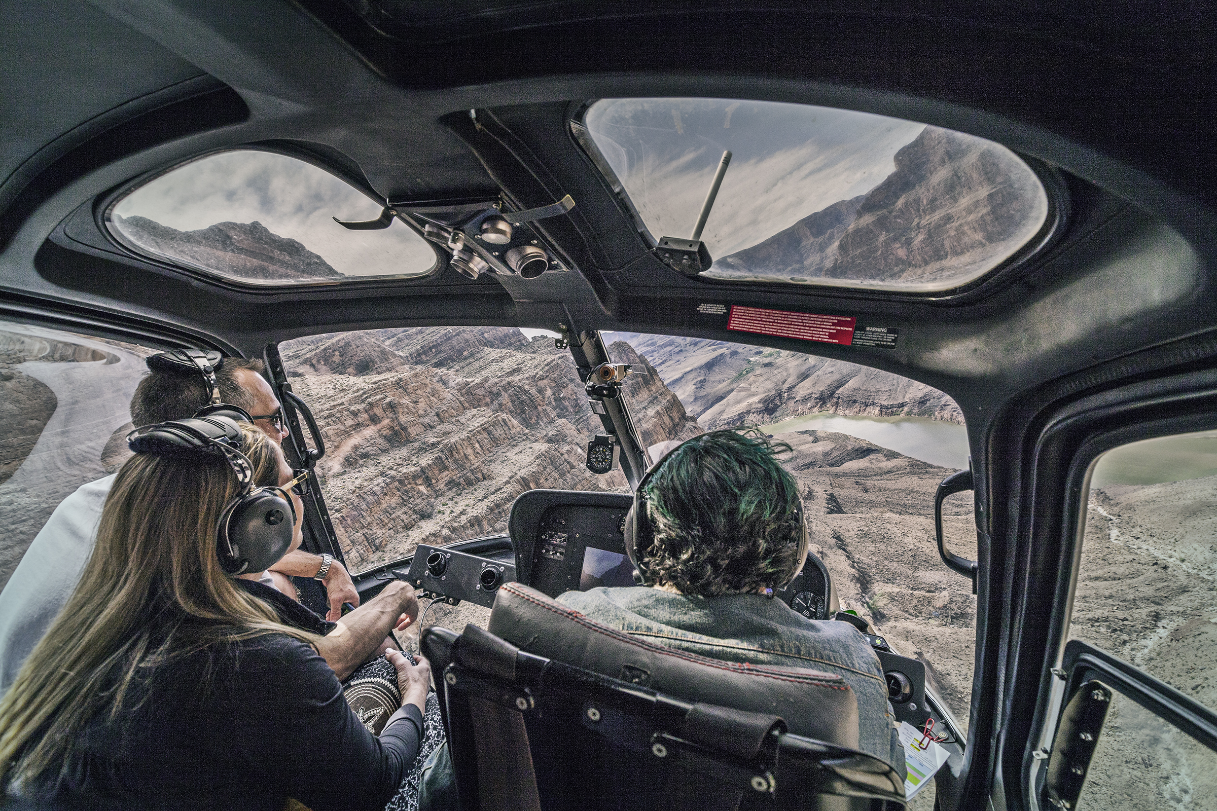 Serenity Helicopters, Grand Canyon, Las Vegas Fun, Maddog piloting chopper over the Colorado, Choppering in to the Abyss, Wick Beavers editorial Portrait